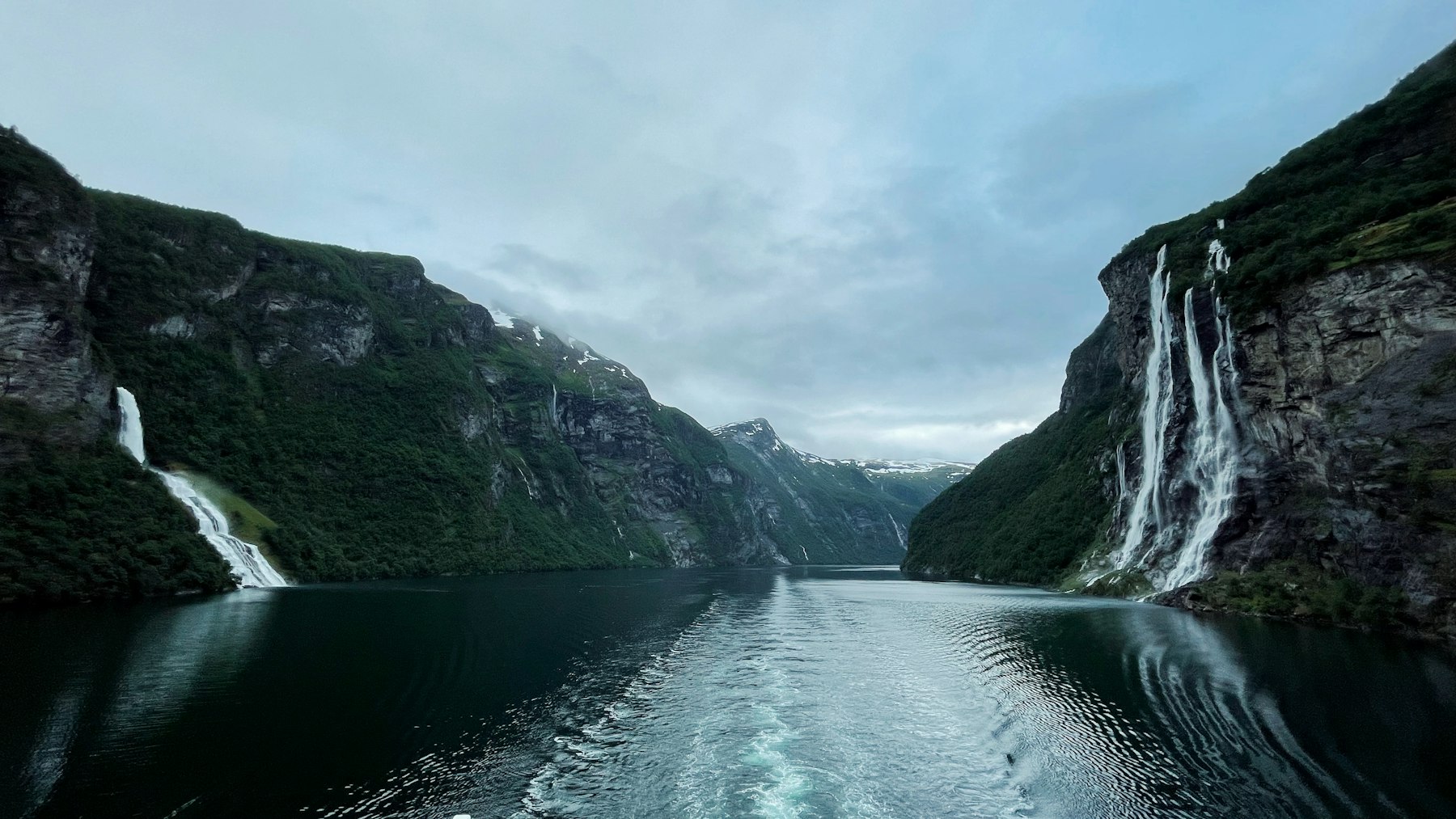 The Seven Sisters waterfall plunging into the fjord